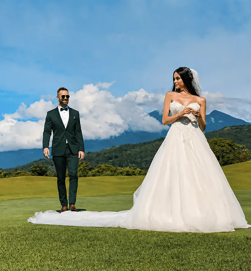 Bride and groom on the Lucero golf course with mountain views, Boquete