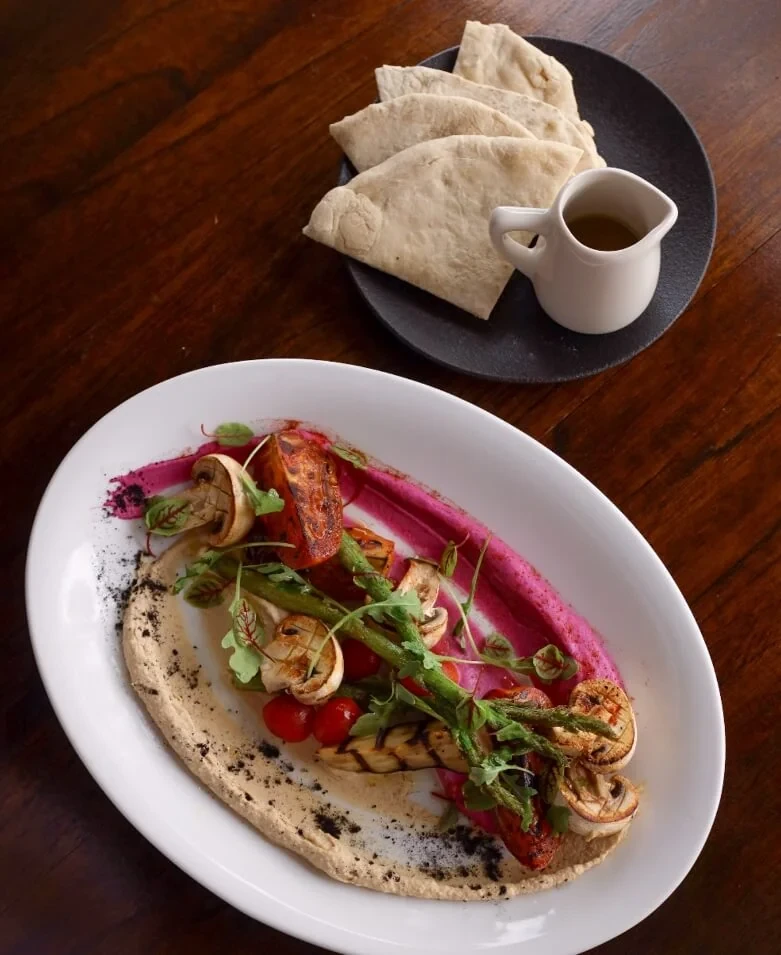 Vegetarian appetizer with hummus and grilled vegetables